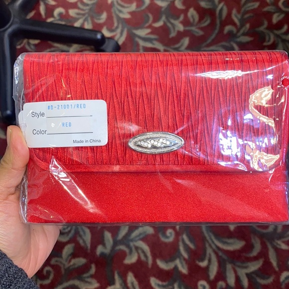 Handbags - Brand new red satin clutch with snap closure